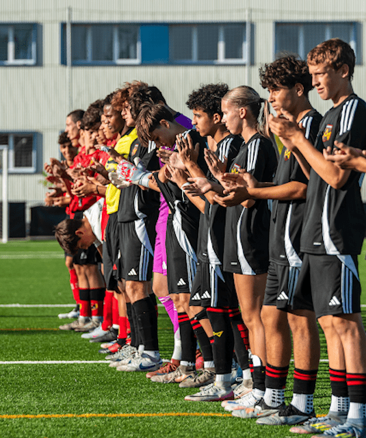 Mesa Team after a match standing on the pitch